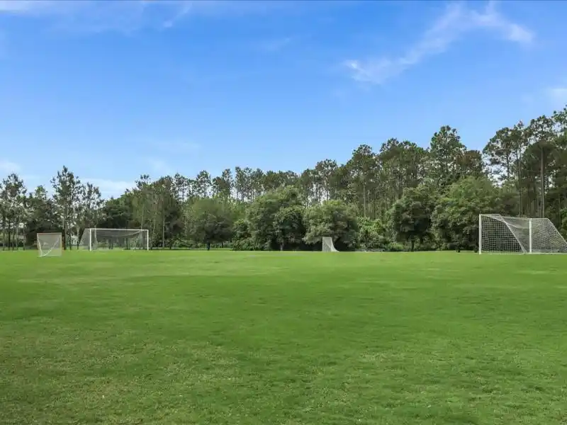 A RARE BLEND OF PRIVACY AND TRANQUILITY IN COASTAL OAKS, NOCATEE – image 60