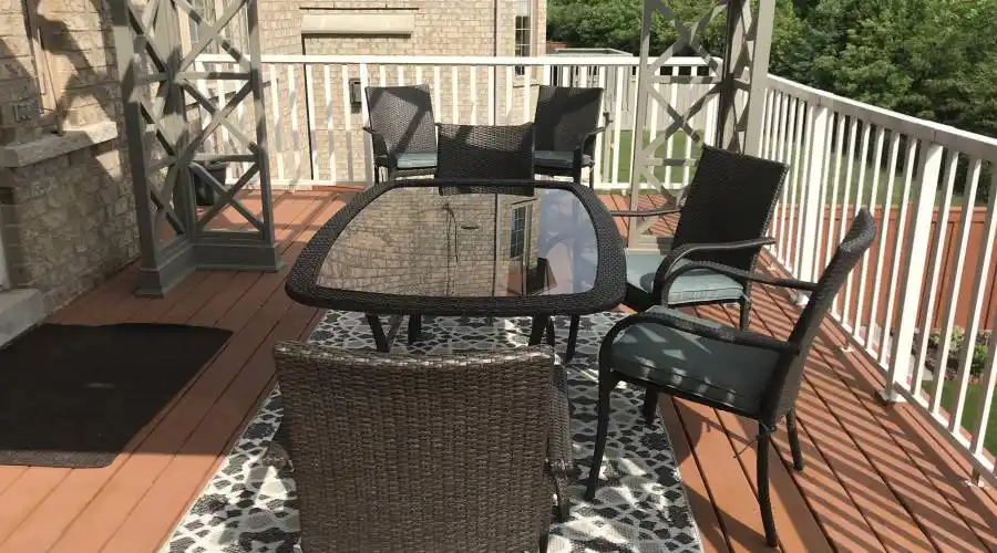 Covered upper level deck lounge area